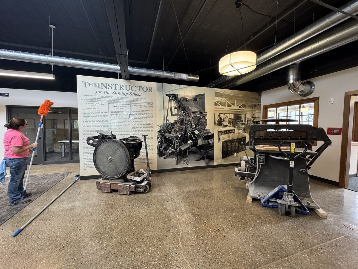 Large-format historical printing press wall mural installed by Good Graphics Co.