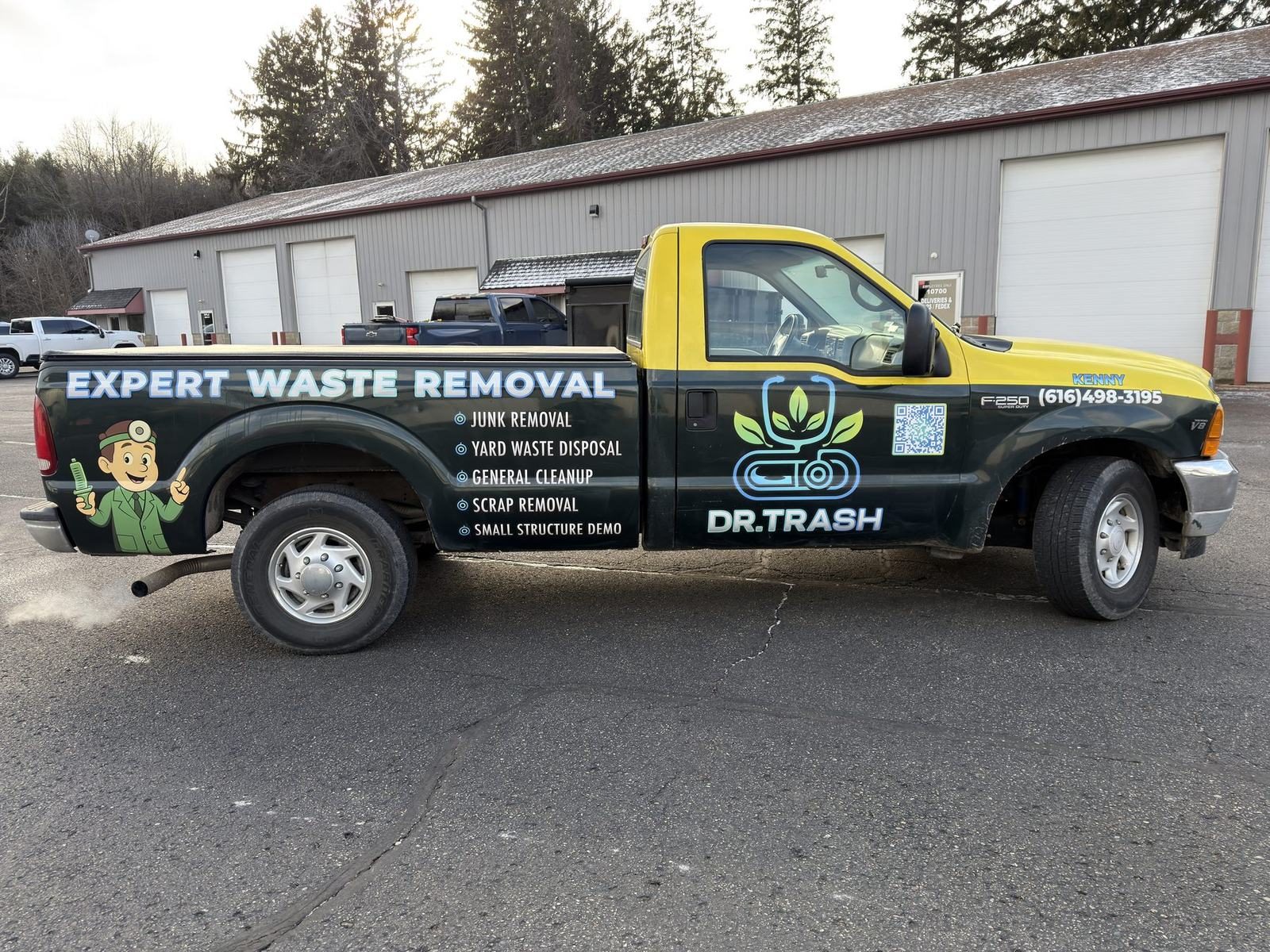 Dr. Trash waste removal work truck with full-side commercial graphics installed by Good Graphics Co.
